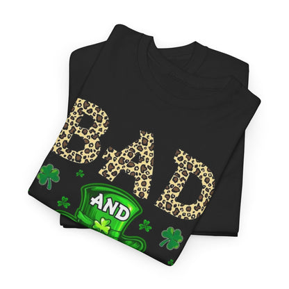Luxury Bad And Boozy St. Patrick's Day T-Shirt folded elegantly, highlighting the unique leopard print style and green-themed graphics, perfect for a celebratory outfit.