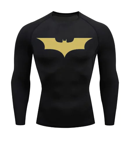 Elegant black long sleeve compression shirt showcasing a gleaming gold Batman symbol, crafted for ultimate comfort and UV protection.