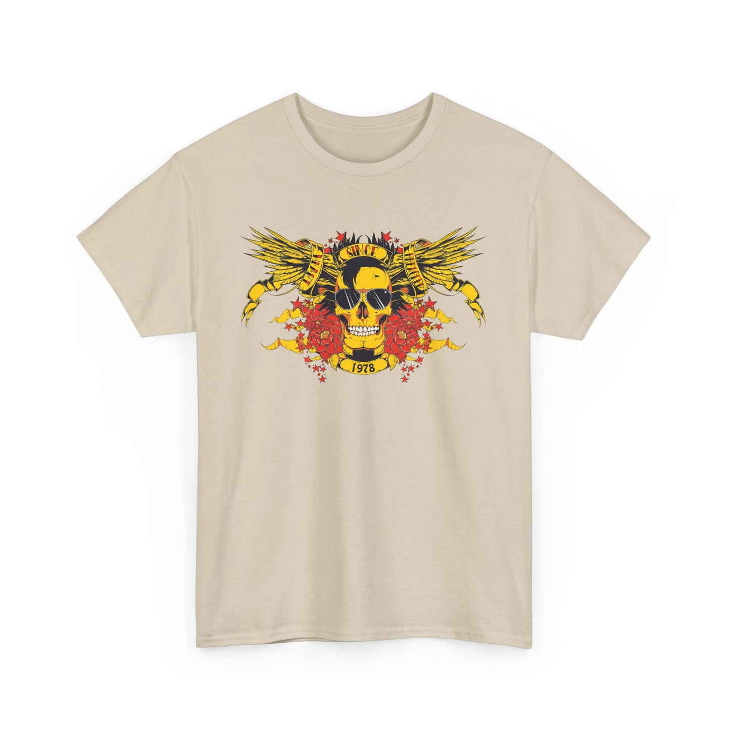 Front view of an exquisite beige t-shirt adorned with a striking yellow skull graphic, wings, and floral accents, embodying a bold fashion statement.