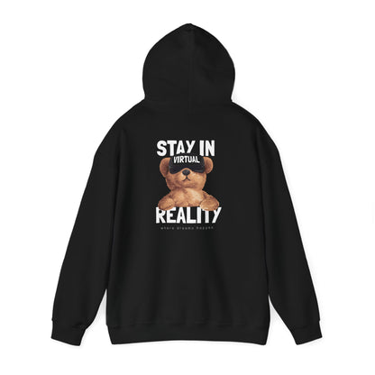 Luxurious black hoodie elegantly displaying a playful teddy bear graphic, emphasising the slogan ‘STAY IN VIRTUAL REALITY’, an ideal choice for stylish escapism.