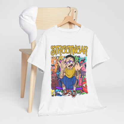 Chic white t-shirt with a bold, playful cartoon graphic highlighting a tattooed character and the text "STREETWEAR", elegantly displayed next to a simple chair.