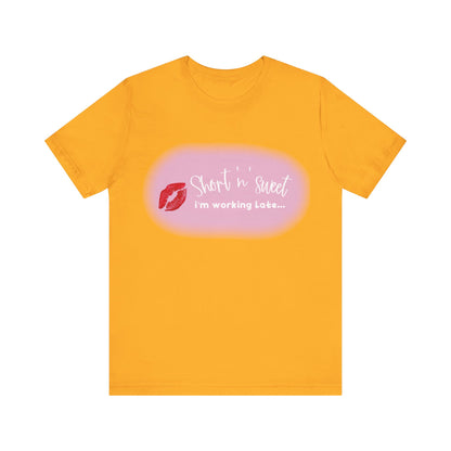 Sabrina Carpenter Inspired Unisex Short Sleeve Tee with a striking lipstick print on a sunny yellow background, ideal for showcasing personality and flair.