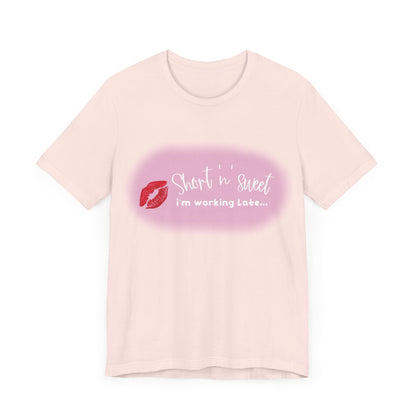 Front view of the Sabrina Carpenter Inspired Unisex Short Sleeve Tee with Vibrant Lipstick Print, focusing on the eye-catching design and luxurious fabric texture.