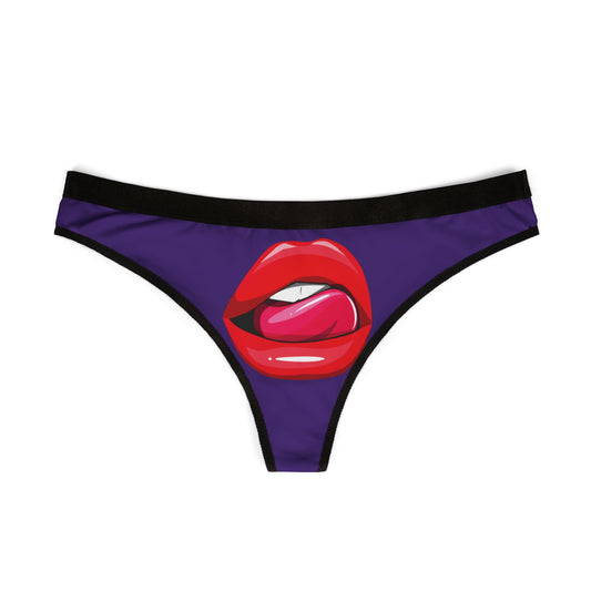 Front view of a vibrant women's thong adorned with an eye-catching graphic of red lips and pink tongue, ideal for romantic occasions.