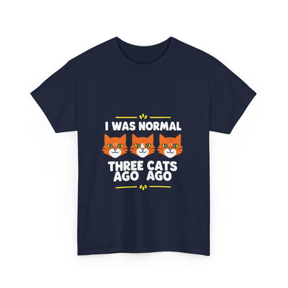 Front view of the Crazy Cat Lady Graphic T-Shirt, displaying a playful graphic design featuring three cat faces and the phrase 'I was normal three cats ago'.