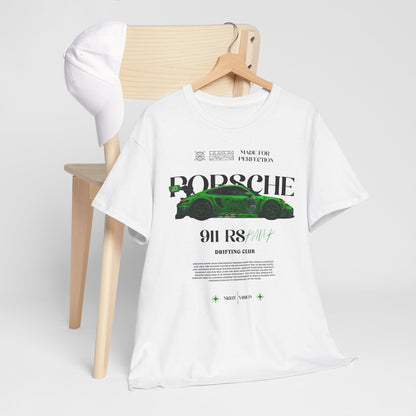 Chic white t-shirt with the Porsche 911 RS graphic paired with a stylish cap on a wooden chair, embodying a lifestyle of elegance and automotive passion.