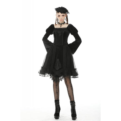 Model wearing the Dark in Love Melisandre embroidered velvet skirt in a gothic setting, accentuating its dramatic silhouette and asymmetrical design.