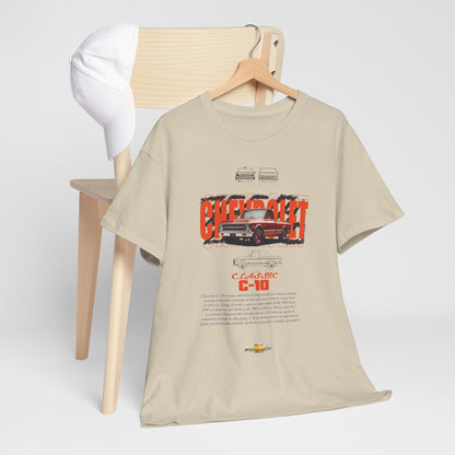 Sophisticated beige Chevrolet C-10 t-shirt draped over a chair, featuring a striking truck design and stylish typography, perfect for casual yet classy outfits.
