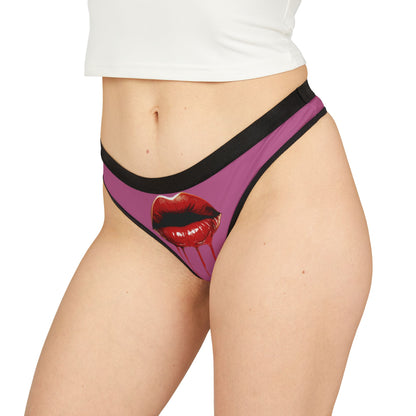 Chic women's thong showcasing a bold graphic design of glossy red lips, embodying a blend of humour and allure.