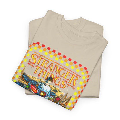 Stylishly folded Stranger Things Rink O Mania graphic t-shirts in beige fabric, highlighting vibrant retro designs that appeal to fans of nostalgia and modern fashion.