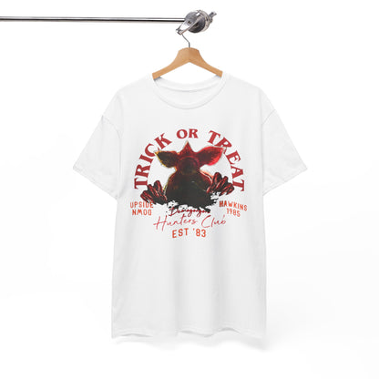 Elegant display of a white unisex t-shirt showcasing a striking Demogorgon graphic and 'TRICK OR TREAT' text, ideal for fans of supernatural themes and style.