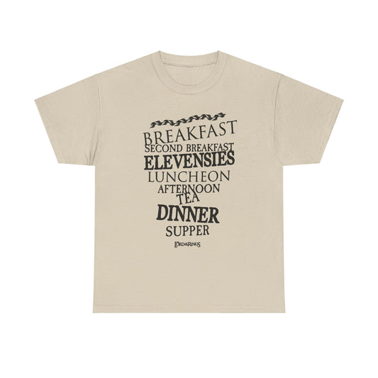 Luxurious beige graphic tee showcasing a vertical arrangement of iconic hobbit meal names from Lord of the Rings, crafted for comfort and style.