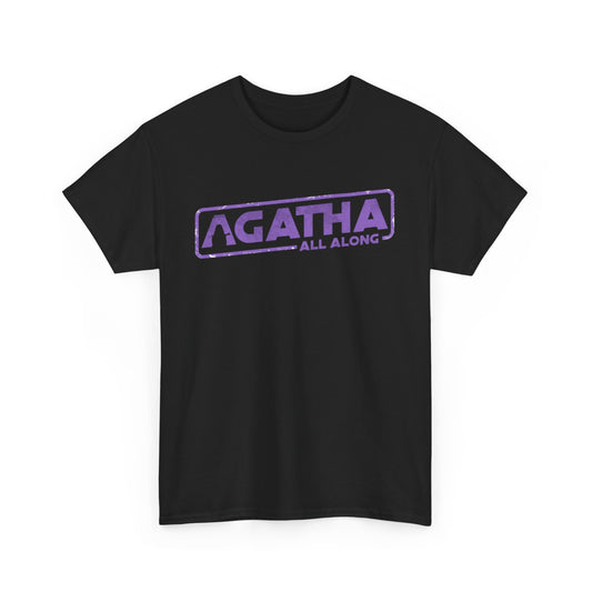 Agatha All Along Unisex Men Women Graphic Funny T-Shirt, showcasing a striking purple logo on a classic black fabric. Perfect for casual outings, blending vintage charm with contemporary humour.