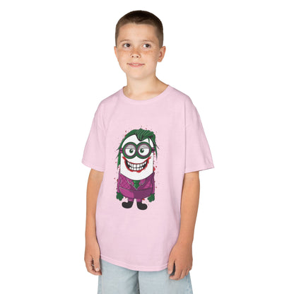 A smiling boy in a pink Minions Joker T-Shirt, designed with a playful mashup of the Minions and the Joker, perfect for children who love comics and cartoons. This t-shirt adds a fun twist to their wardrobe, making it a fantastic Funny Minions T Shirt.