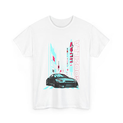 Stylish white graphic T-shirt displaying a vibrant Godzilla city scene and a dynamic sports car design, perfect for fashion enthusiasts.