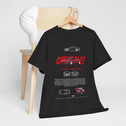 Elegant black Chevrolet Corvette C6 t-shirt beautifully arranged on a wooden chair with a white cap, showcasing premium artwork dedicated to automotive excellence.