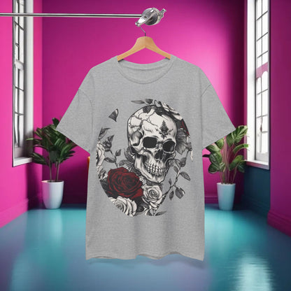 Skulls and Roses Cotton Tee displayed in a stylish interior setting, highlighting the unique graphic design of skulls and roses against a grey background.