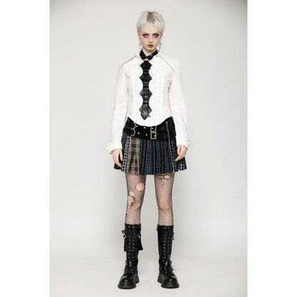 Close-up view of the Dark In Love patchwork leather-waist mini skirt highlighting the intricate plaid details and rebellious faux buckle design.