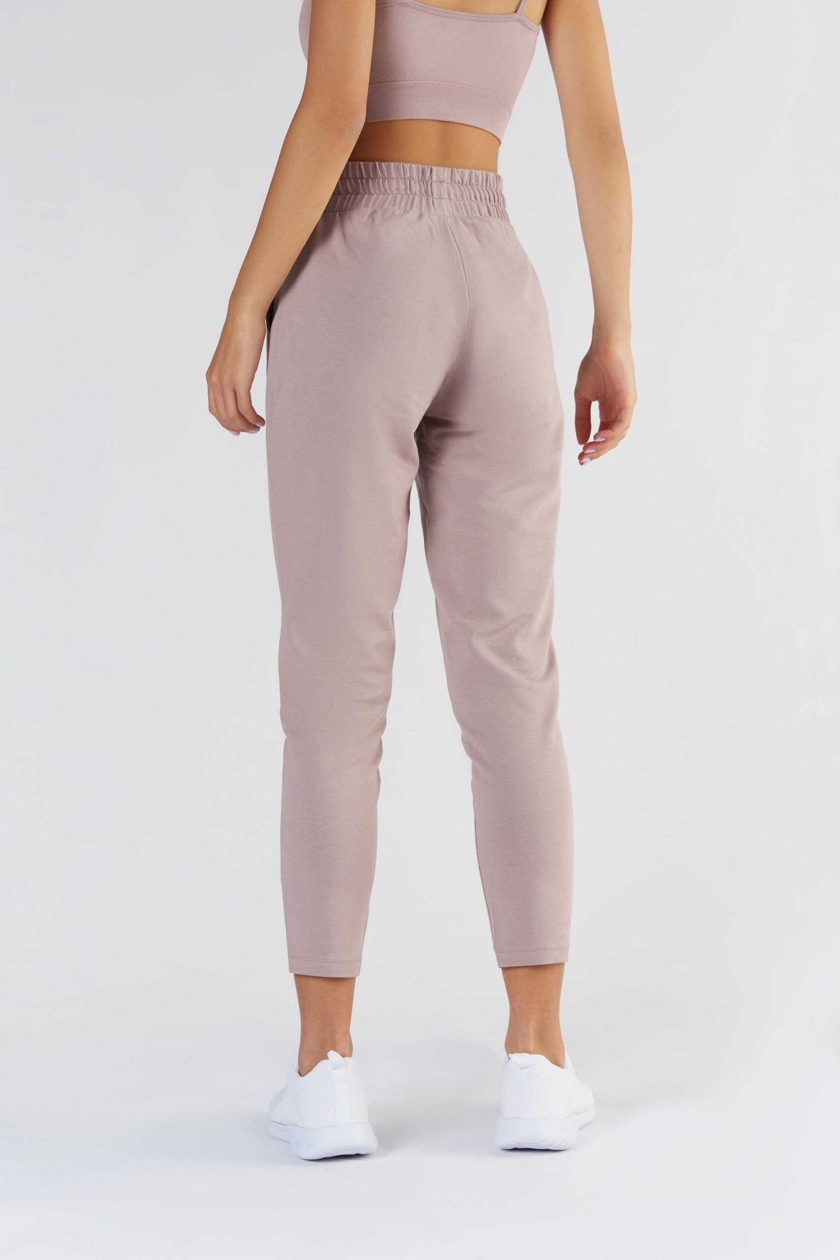 Luxurious women's sweatpants featuring a relaxed fit, crafted from an organic cotton blend for ultimate comfort.