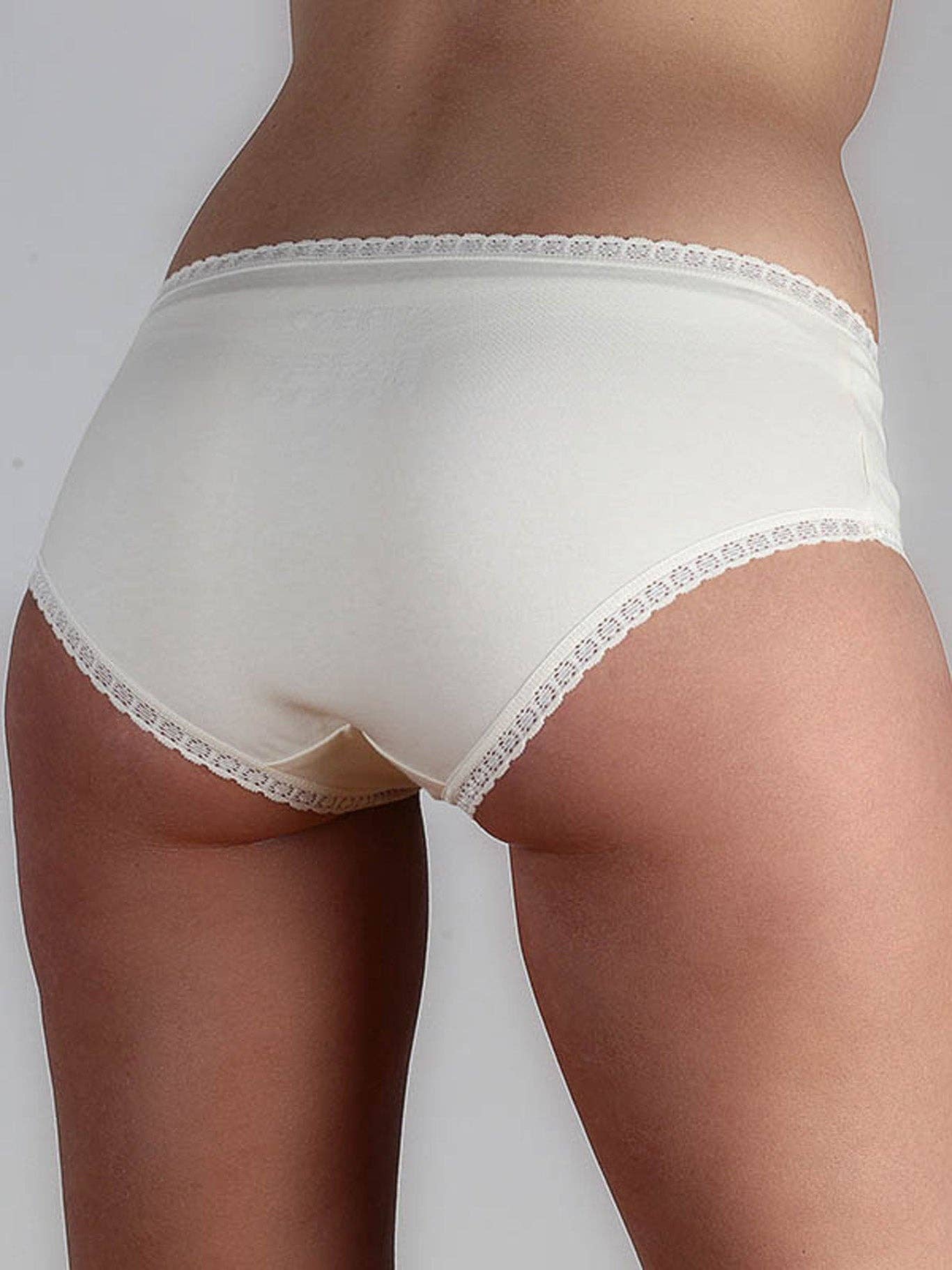 Luxury organic cotton hipster briefs featuring delicate soft lace trim at the waistband and leg openings, designed for ultimate comfort.