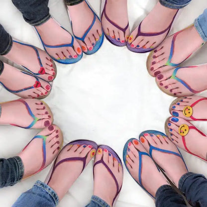 Artistic arrangement of Women's Novelty Gift Super Comfy Manicure Print Socks alongside vibrant colourful toe designs, showcasing a fun group fashion statement.