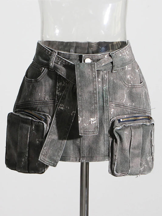 DEAT Women's Distressed Denim Skirt with Lace-Up Belt and Camouflage Design featuring a stylish front view showcasing unique stitching and two large functional pockets.