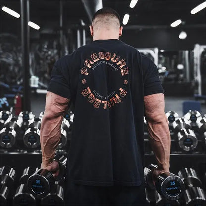 A stylish model wearing the Men's Summer Gym Sports Tee by Dazzling Dreams Studio, demonstrating the flexible fit and luxurious design perfect for peak performance.