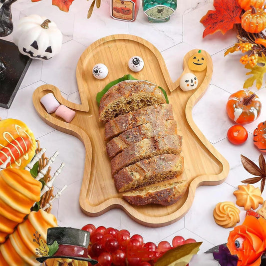 Elegant Halloween Ghost Wood Pan Plate showcasing sliced bread, surrounded by festive autumn decorations, perfect for entertaining. Ideal for serving treats on this Funny Bamboo Wood Cheese Platter Tray For Candy Cookie. Dazzling Dreams Studio signature design.