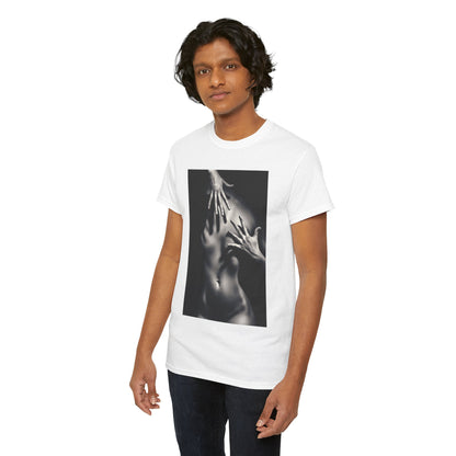 Stylish male figure presenting a visually striking graphic tee with an artistic depiction of hands on a torso, reflecting high-end urban fashion and artistic flair.