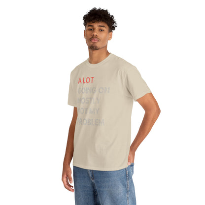 A stylish man showcasing the premium men's t-shirt with a humorous graphic, 'A LOT GOING ON MOSTLY NOT MY PROBLEM', highlighting a comfortable and sophisticated casual look.
