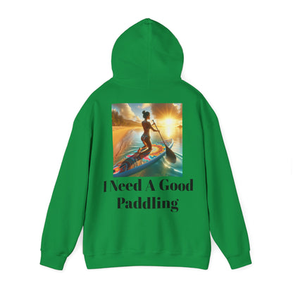 Chic back view of a green Fantasy Paddleboarding Unisex Hooded Sweatshirt, adorned with the phrase 'I Need A Good Paddling' and an artistic paddleboarding image.