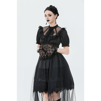Model gracefully posing in the Dark in Love Ebon Rose High-Low Gothic Dress, illustrating its dramatic puff sleeves and flowing silhouette perfect for alternative events.