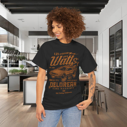 Urban unisex Delorean Back to the Future graphic t-shirt featuring an artistic design, worn by a smiling individual in a modern kitchen setting.