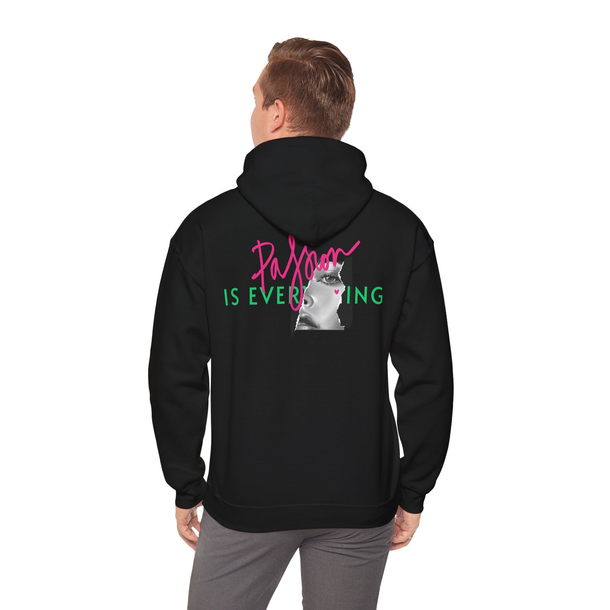 Luxurious black hoodie featuring bold back print with vibrant hot pink cursive text 'Passion' and striking green text 'IS EVERYTHING', complemented by a captivating black and white portrait artwork, designed for stylish individuals.