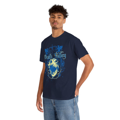 Stylish model showcasing a navy blue t-shirt with intricate skull graphic design and 'Death Valley' text, perfect for bold fashion statements.
