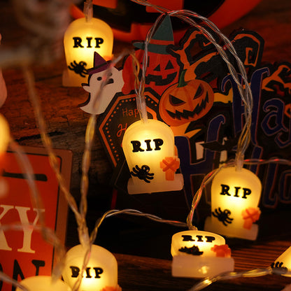 PVC Soft Material Halloween Lighting Chain featuring charming RIP tombstone designs, perfect for indoor and outdoor home decoration. Ideal for creating a warm, inviting festive atmosphere.