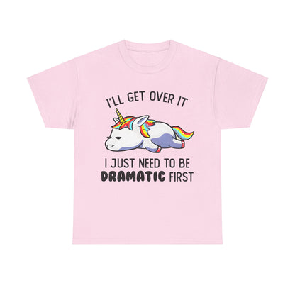 Unicorn Melancholy Graphic Tee in pink; sophisticated whimsical fantasy shirt highlighting a cartoon unicorn with the powerful slogan, 'I’LL GET OVER IT I JUST NEED TO BE DRAMATIC FIRST'.