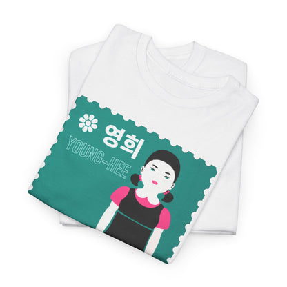 Luxurious folded white t-shirt displaying 'Young-Hee' stamp design from Squid Game, combining unique artistic flair and comfort.