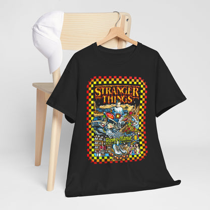 Luxury Stranger Things Rink O Mania graphic tee displayed on a wooden chair alongside a white cap, showcasing vibrant retro artwork and playful design.