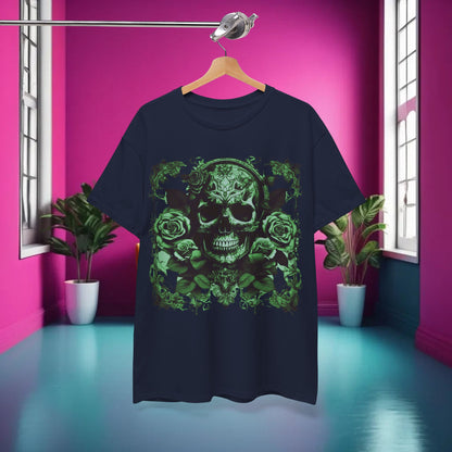 Skulls and Roses Cotton Tee displayed in a vibrant pink room, featuring a striking green skull and rose design, perfect for alternative fashion enthusiasts.