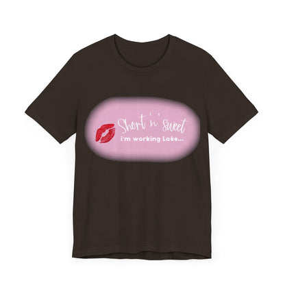 Sabrina Carpenter Inspired Unisex Short Sleeve Tee in dark colour with vibrant lipstick print and playful text, a must-have for fans.