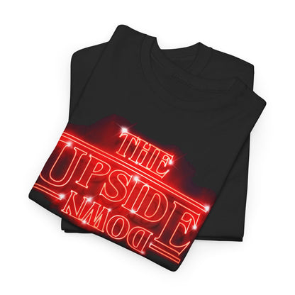High-end black t-shirt elegantly folded, featuring red neon design of 'THE UPSIDE DOWN', reflecting a taste for unique fashion inspired by popular culture.