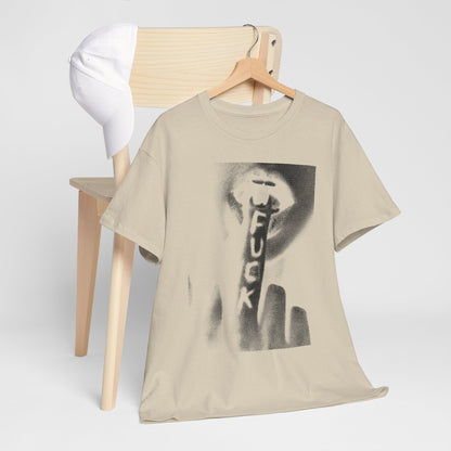 Chic beige graphic t-shirt displayed next to a minimalist wooden chair and white cap, highlighting a distinctive artistic print.