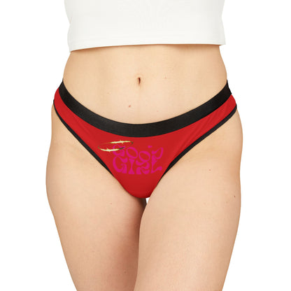 Chic red 'Good Girl' thong panties worn comfortably, designed with trendy black edges and a playful logo, radiating confidence and allure.
