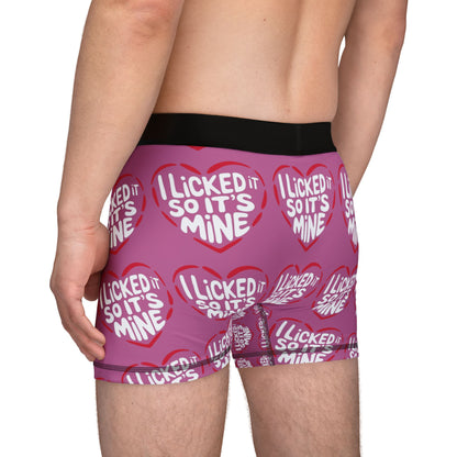 Valentine's Naughty Cheeky Men's Boxer Briefs captured from the back, featuring a playful heart design with the phrase 'I LICKED IT SO IT'S MINE', perfect for adding fun to romantic moments.