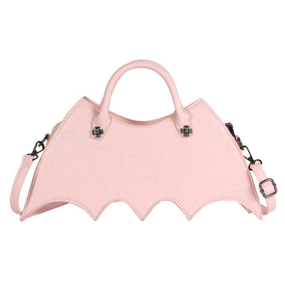 Chic Halloween Spider Web Shape Shoulder Bag in soft pink, reflecting unique Batgirl design, perfect for autumn outings and Halloween celebrations.