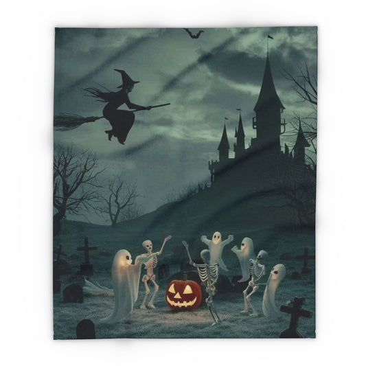 Elegant Halloween-themed Arctic fleece blanket showcasing an intricate design of playful ghosts, skeletons, and a witch against a gothic castle backdrop, ideal for an opulent Halloween celebration.