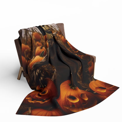 Elegant Decorative and Warm Halloween Spooky Arctic Fleece Blanket displaying a scarecrow and pumpkins, gracefully cascading over a modern armchair, perfect for luxurious autumn nights.