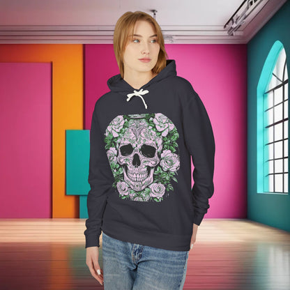 Stylish model wearing a Unisex Lightweight Hooded Sweatshirt with an eye-catching skull and roses design, set against a vibrant interior, blending luxury with a contemporary flair.