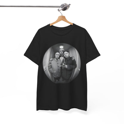 Chic graphic t-shirt elegantly hanging, featuring a playful illustration of prominent world figures, combining humour with a stylish wardrobe essential.